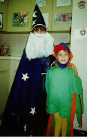 Children dressed as wizard and jester.