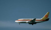 Airplane flying against a clear sky.
