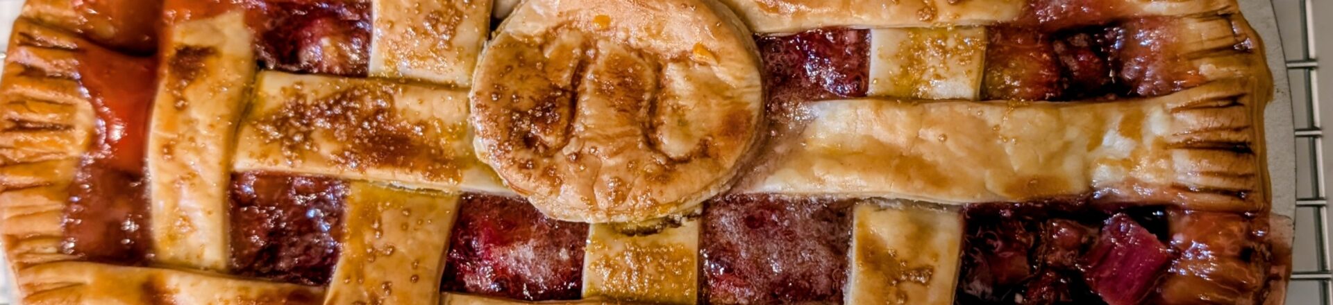 Homemade strawberry rhubarb lattice pie baked for Pi Day Short, descriptive, and natural.
